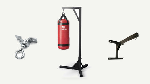 A PROLAST ceiling mount, a red heavy bag hanging on a single bag stand, and a heavy bag wall mount
