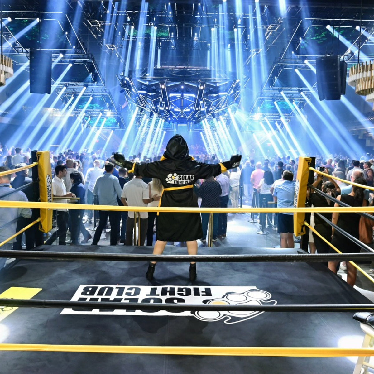 PROLAST boxing ring with yellow ropes at a fight night