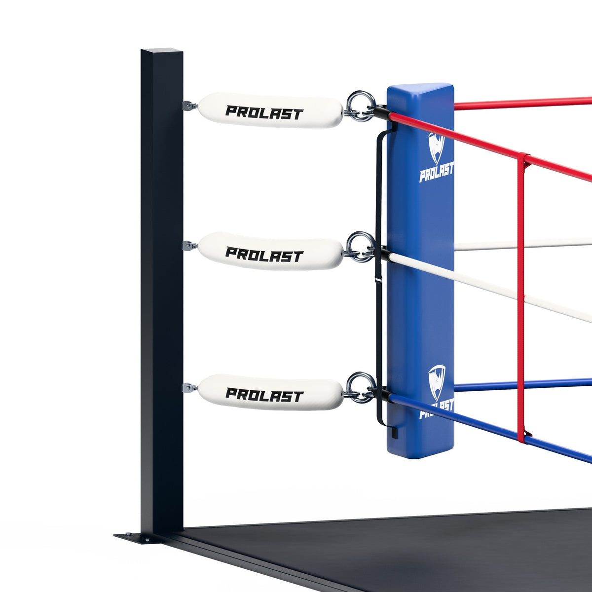 Corner of a PROLAST floor boxing ring: steel post, three PROLAST turnbuckle covers and a blue corner pad with the PROLAST shield
