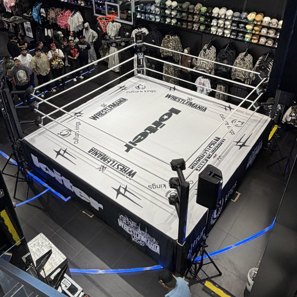 PROLAST boxing ring with a white printed canvas in a store, seen from above