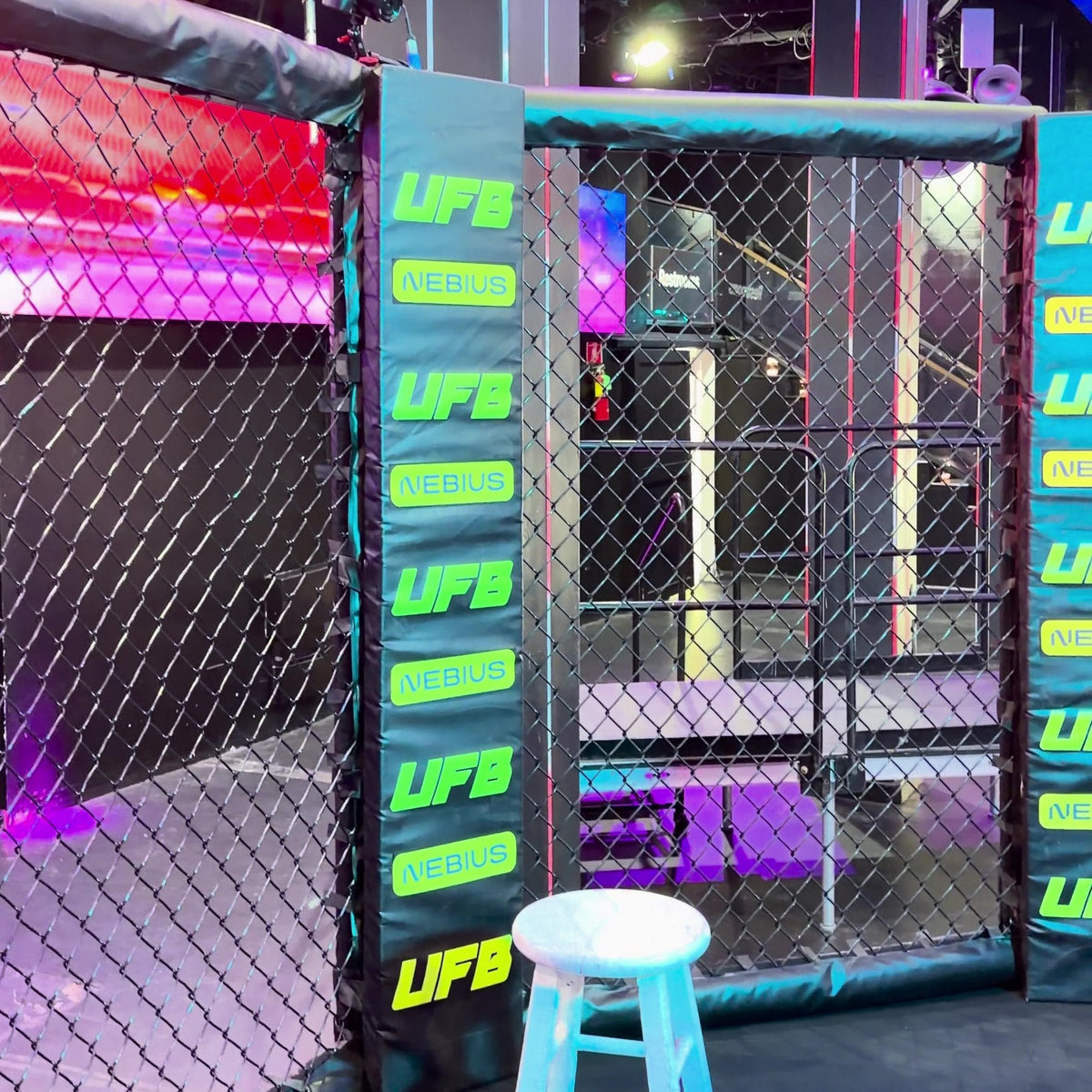 Inside a PROLAST MMA cage with padded posts