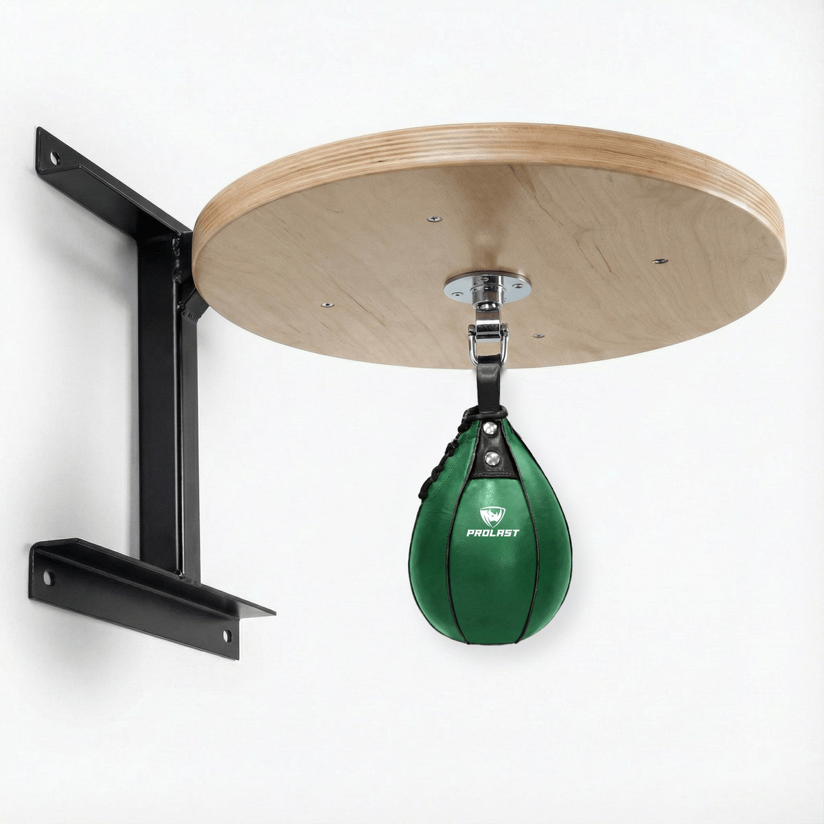 PROLAST green leather speed bag hanging from the PRO ELITE swivel under the PROLAST hardwood speed bag platform