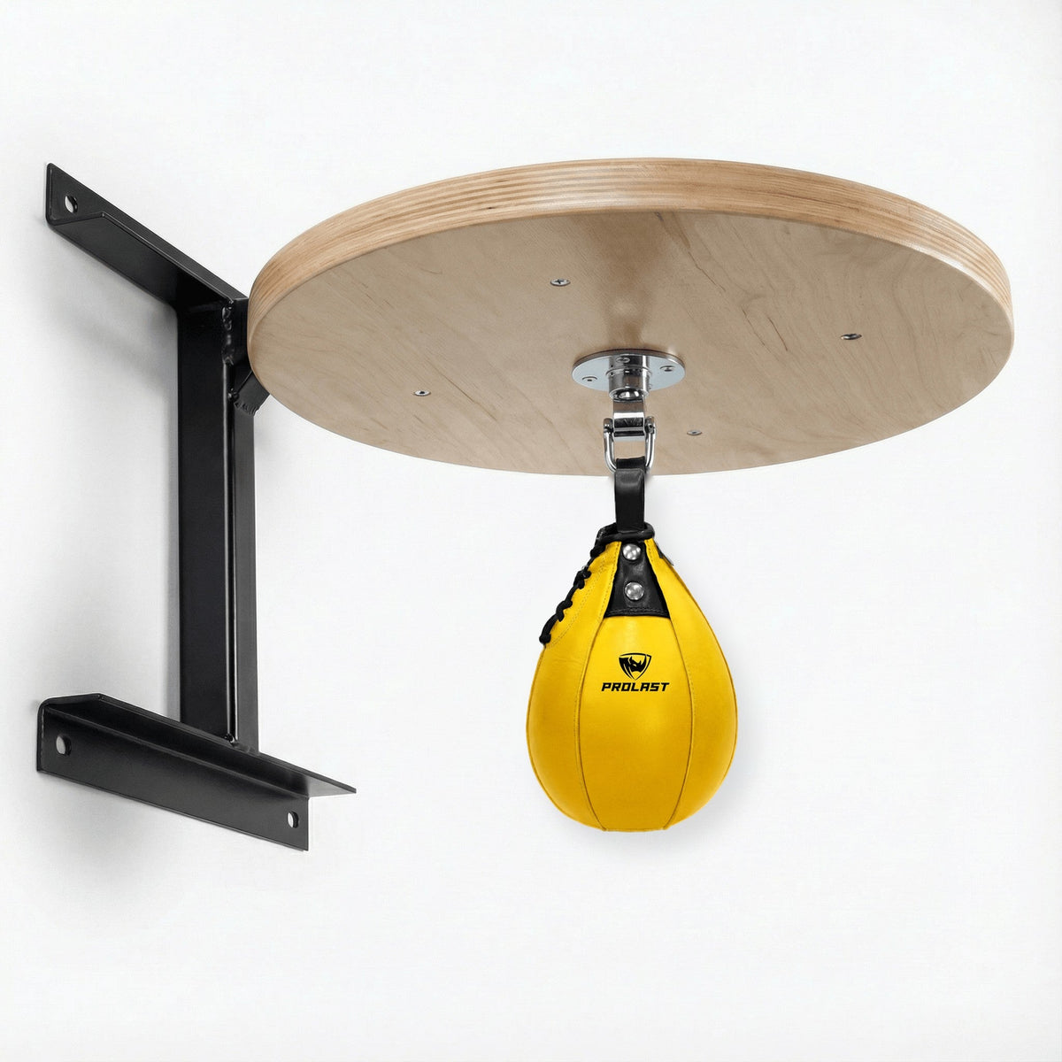 PROLAST yellow leather speed bag hanging from the PRO ELITE swivel under the PROLAST hardwood speed bag platform