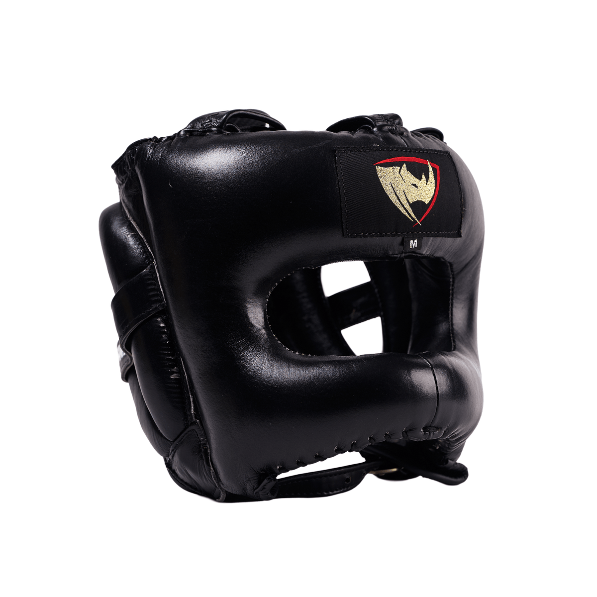 PROLAST nose bar face saver headgear in black, angled front view with gold-and-red rhino logo patch and padded face bar