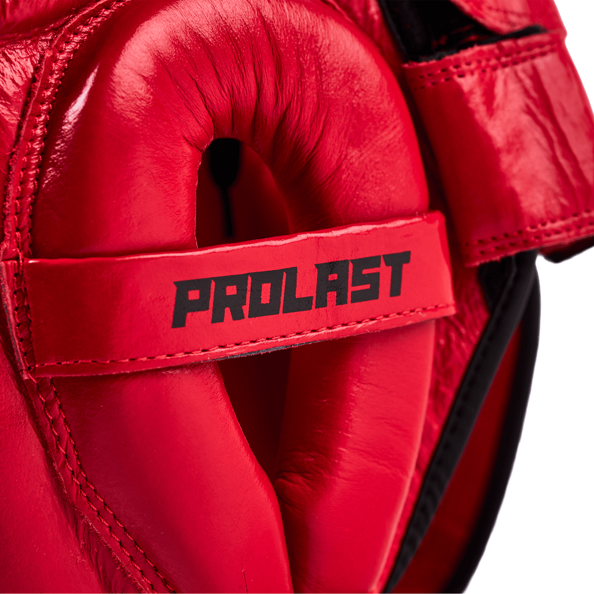 PROLAST nose bar face saver headgear in red, close-up of the ear guard with the PROLAST strap