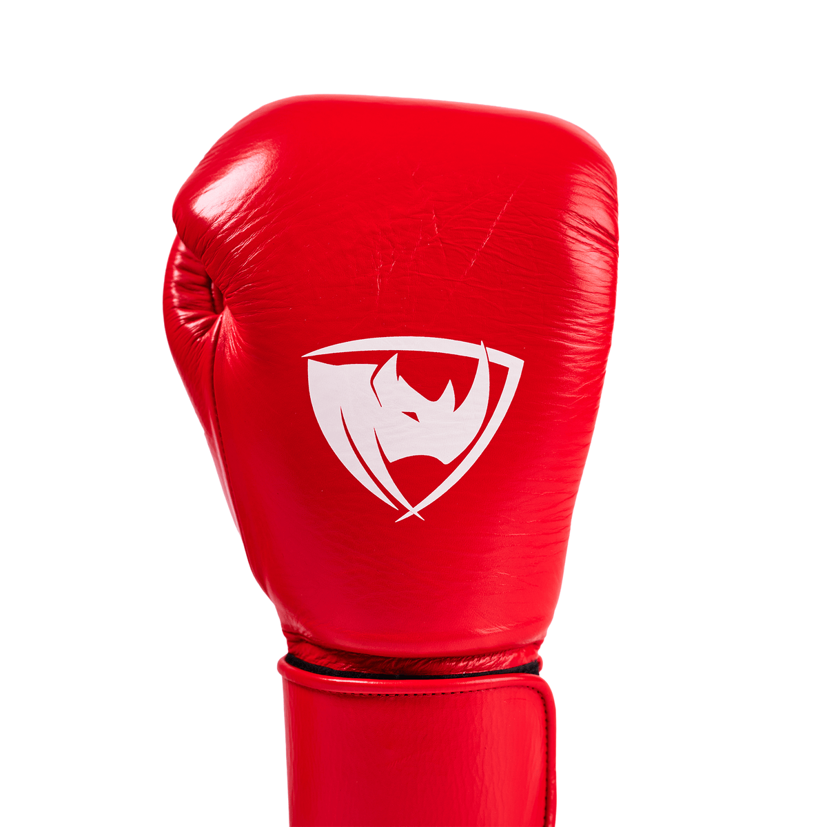 PROLAST PG professional boxing gloves in crimson red, close-up of one glove front with white rhino logo