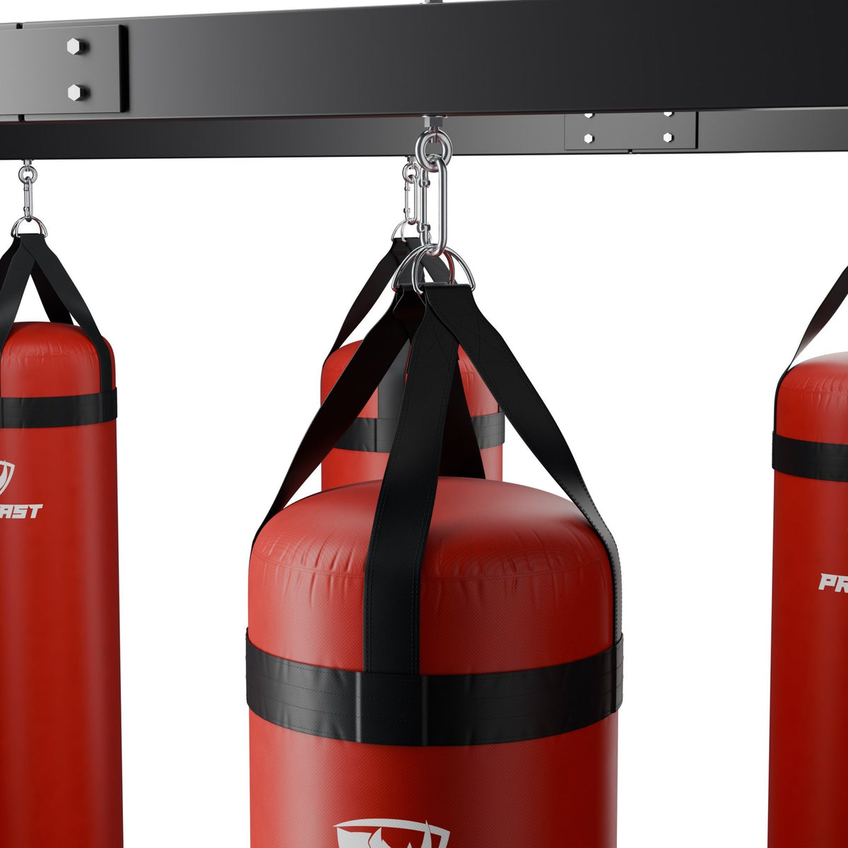 Close-up: an eye bolt under the top beam; a PROLAST heavy bag hangs from it on a steel snap hook through its D-rings