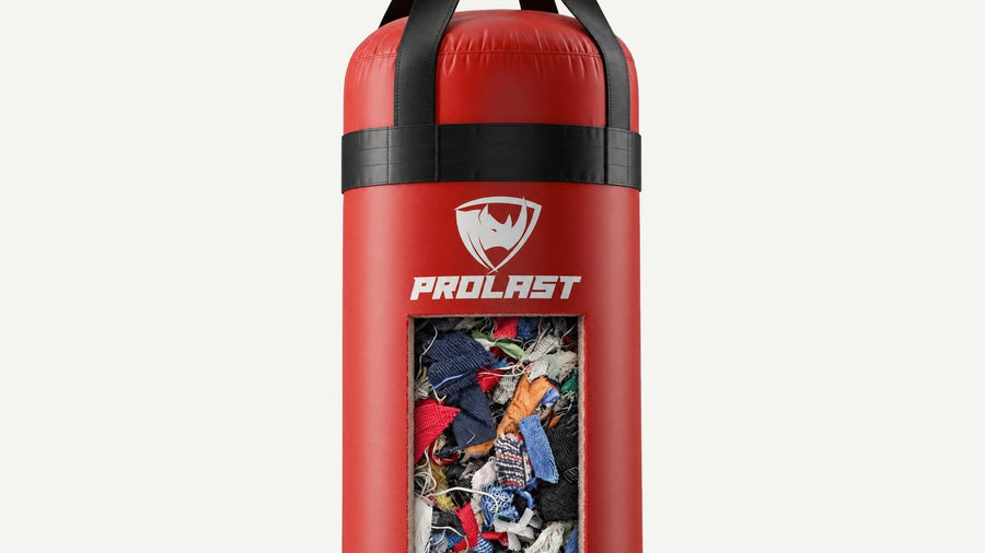 A red PROLAST heavy bag with a cutaway window showing its shredded cotton fabric fill
