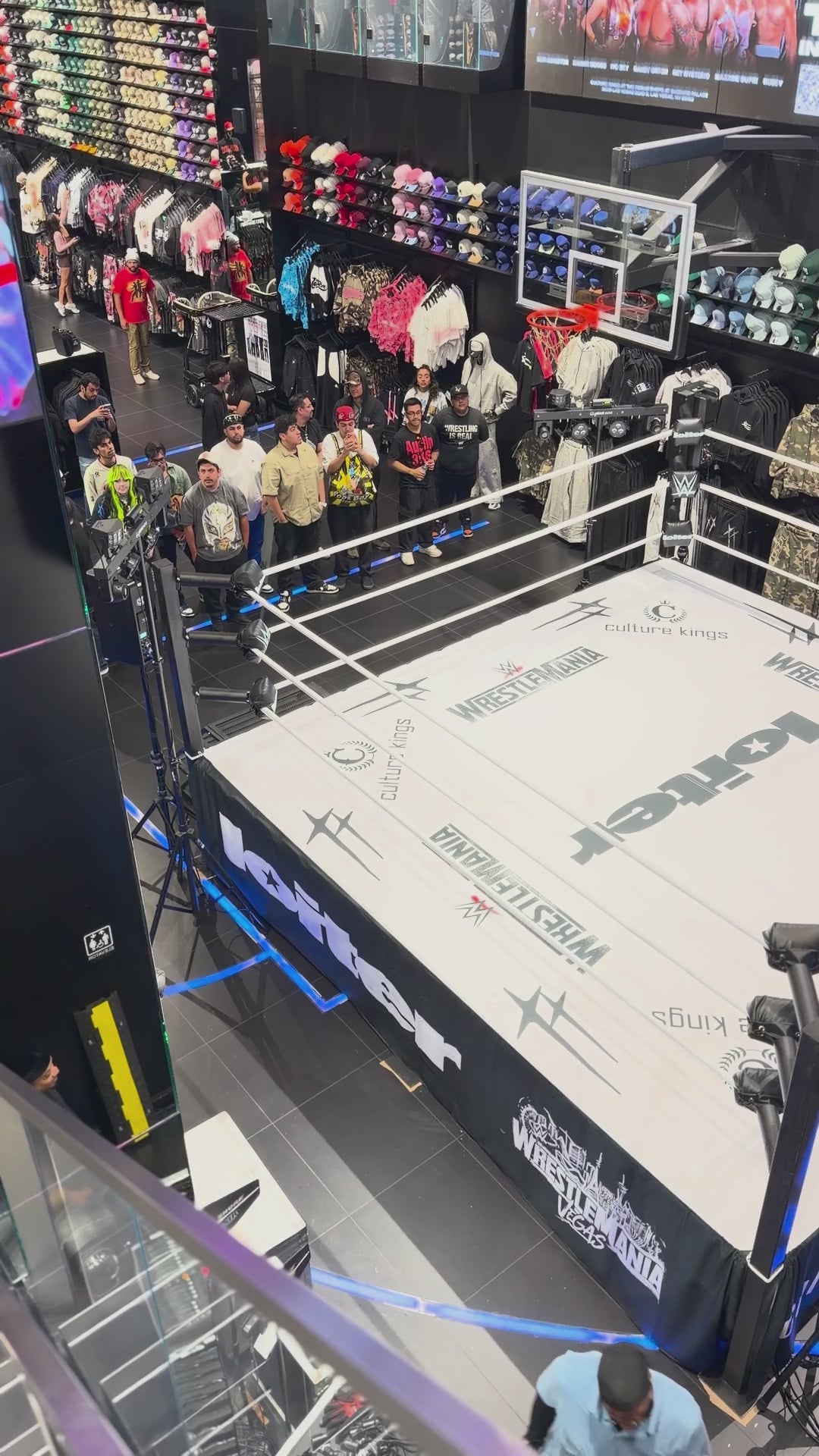 PROLAST boxing ring in a store with a crowd, seen from above