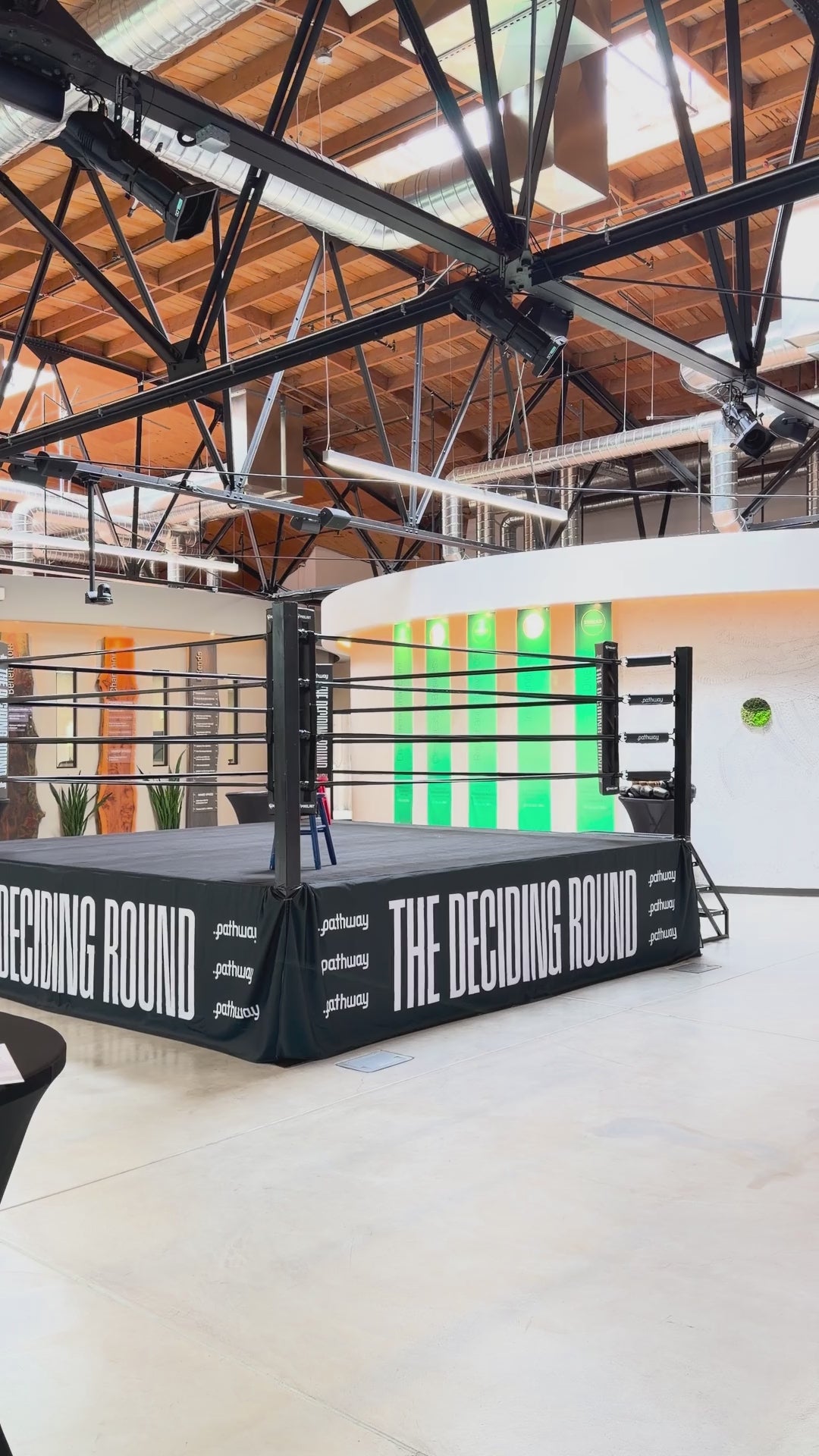 PROLAST boxing ring with a printed skirt in an event hall