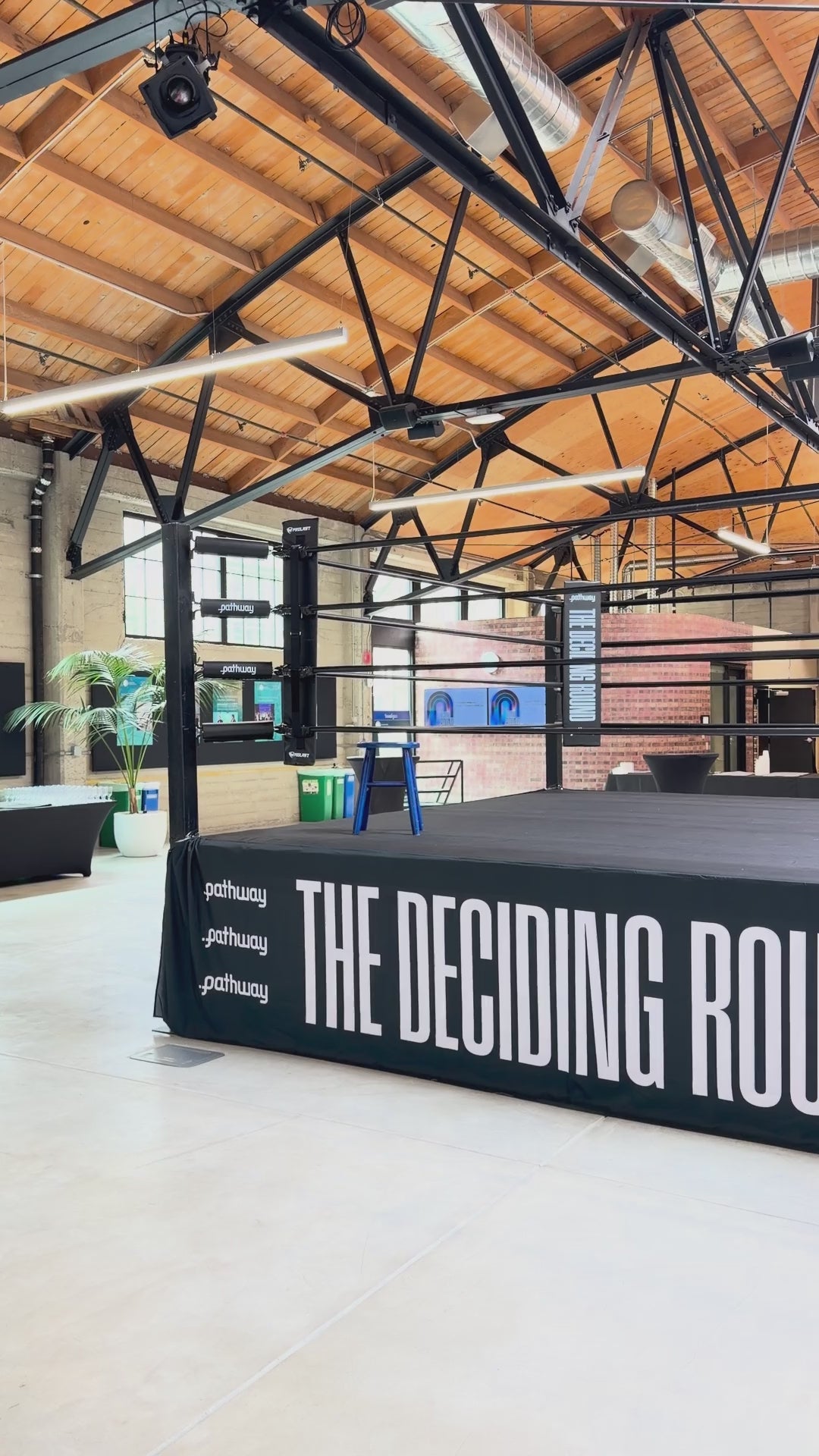 PROLAST boxing ring with a printed skirt in an event hall