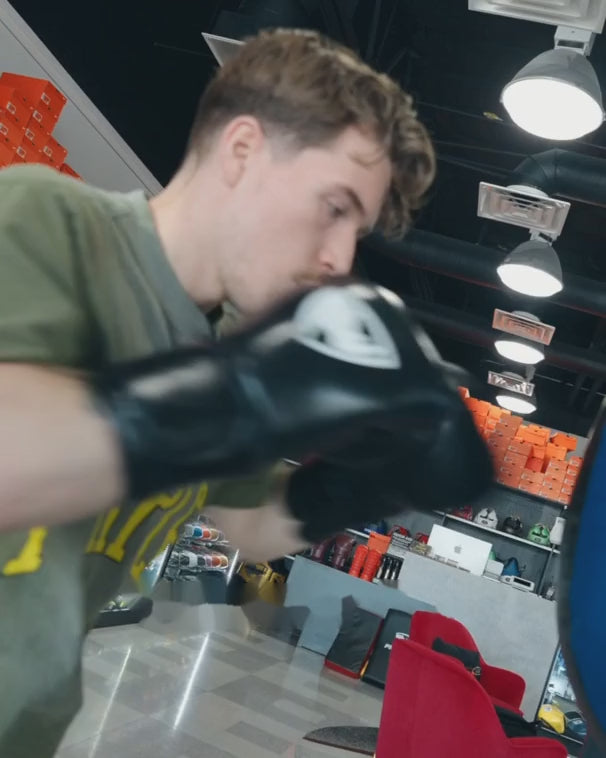 Uppercuts and hooks on a PROLAST wrecking ball in the PROLAST showroom