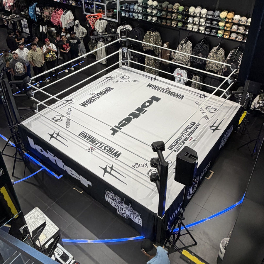PROLAST boxing ring with a white printed canvas in a store, seen from above