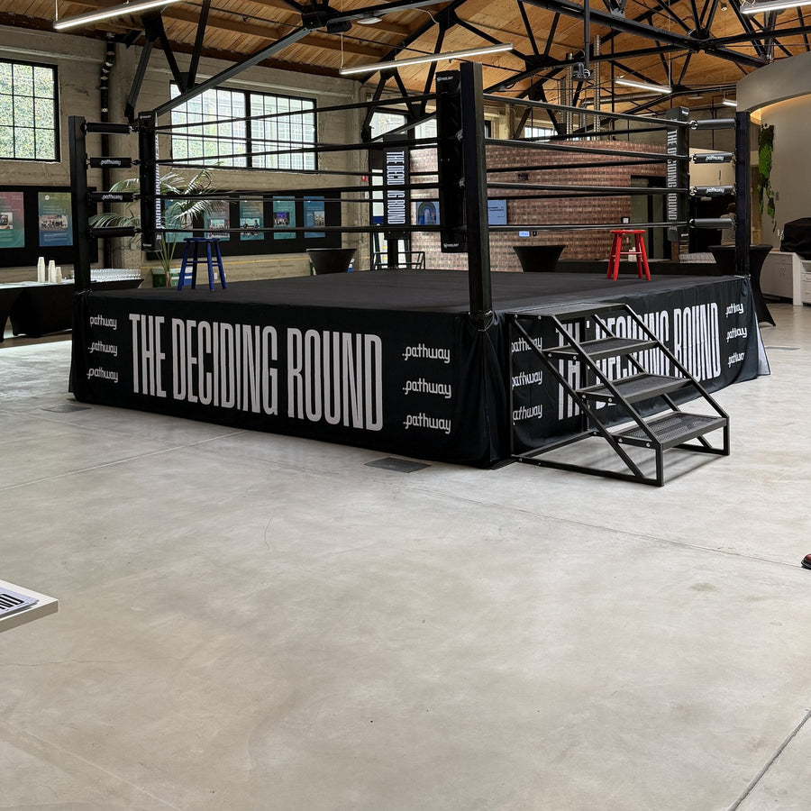 PROLAST boxing ring corner with steel stairs and a printed skirt