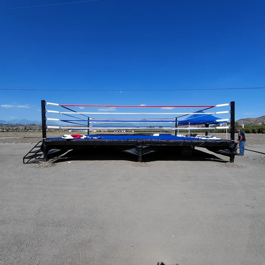 PROLAST boxing ring with a blue canvas set up outdoors