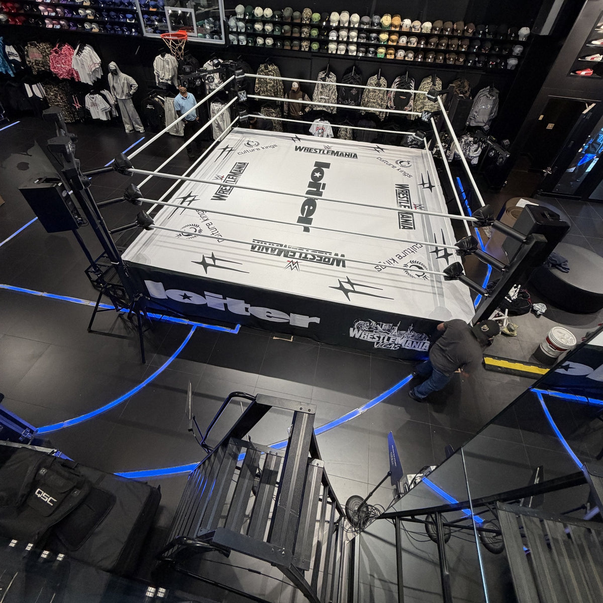 PROLAST boxing ring with a white printed canvas in a retail store, seen from above