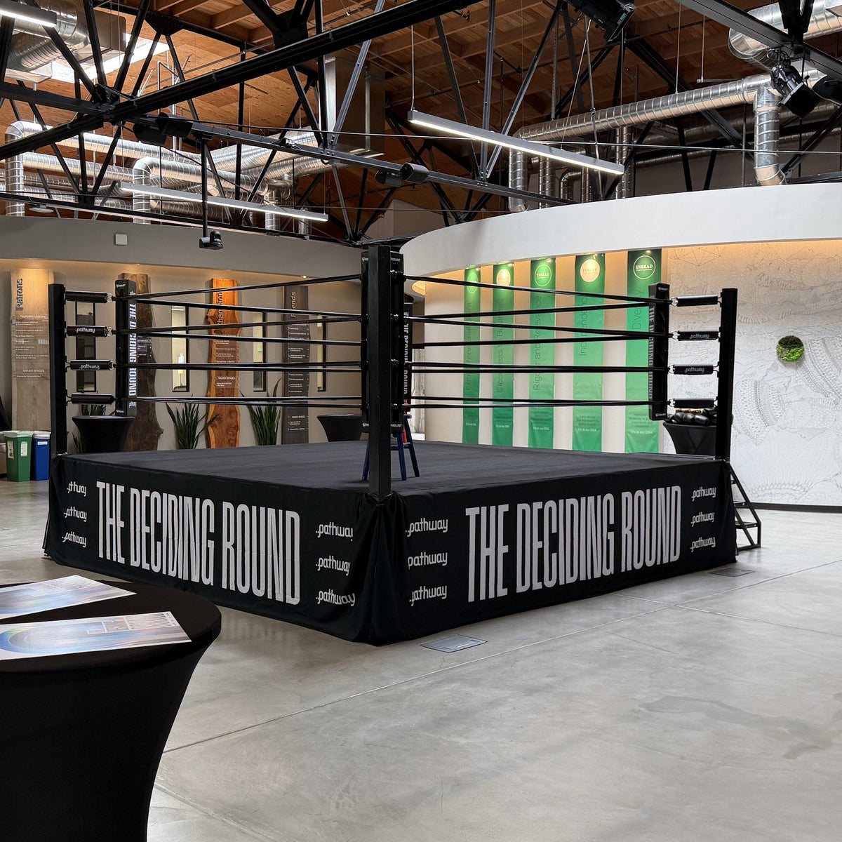 PROLAST boxing ring with a custom printed skirt in an event hall