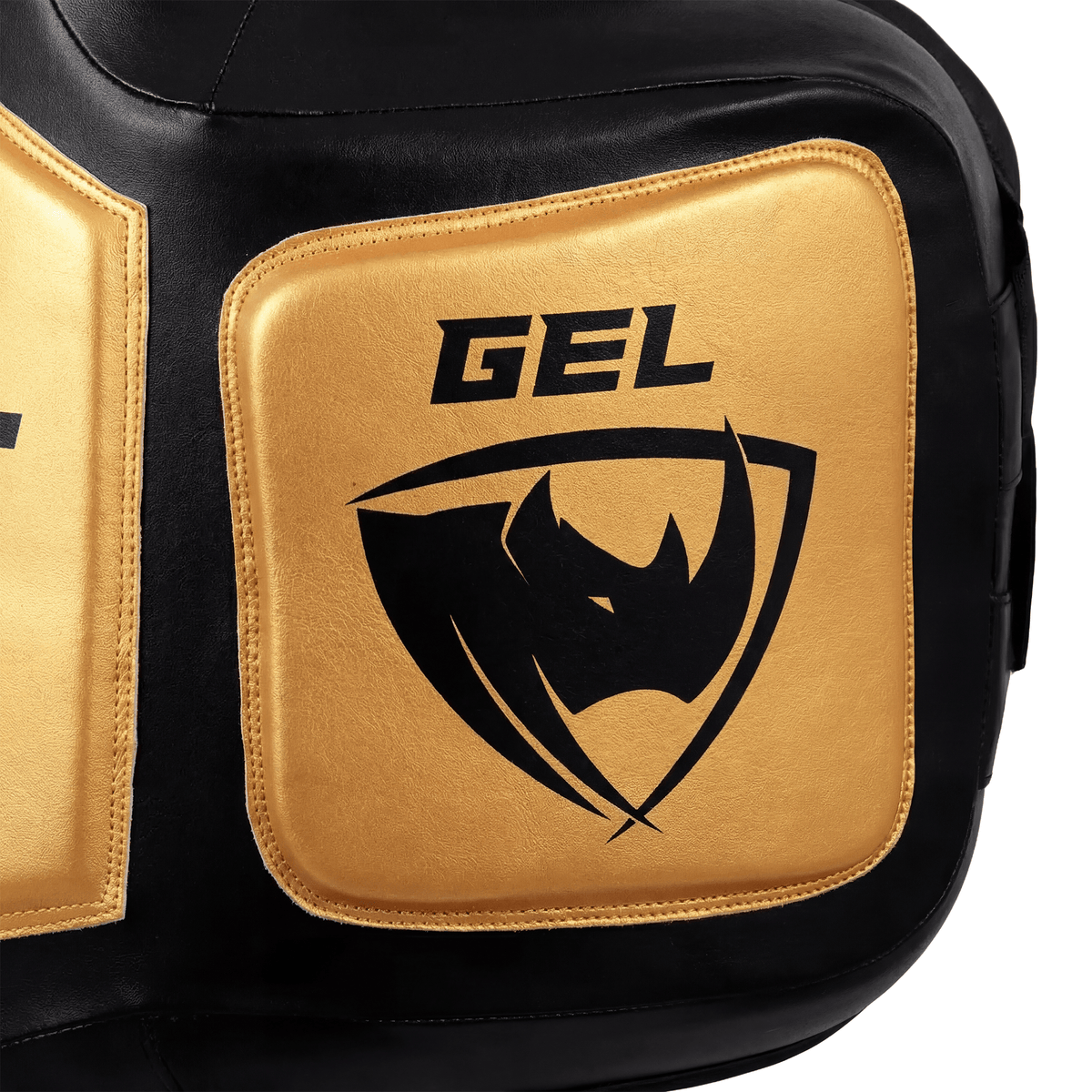 PROLAST Platinum gel boxing body protector in black and gold, close-up of a gold GEL side pad with the rhino logo