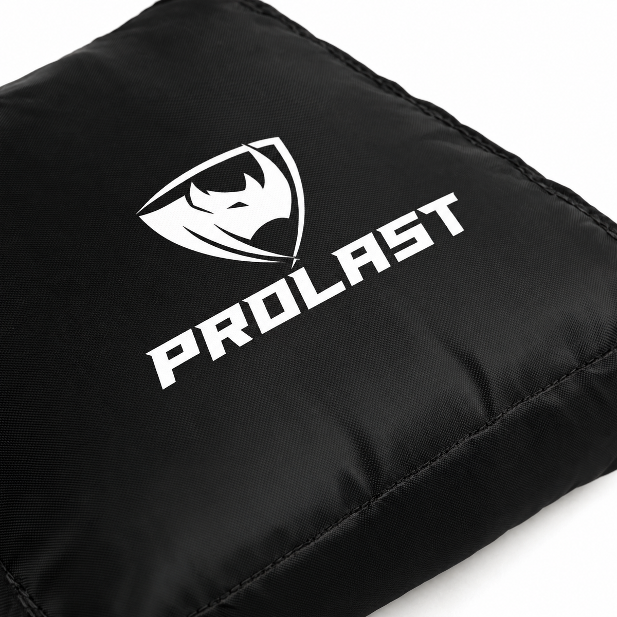PROLAST 55 lb sand bag close-up: the white PROLAST rhino logo and wordmark on black nylon