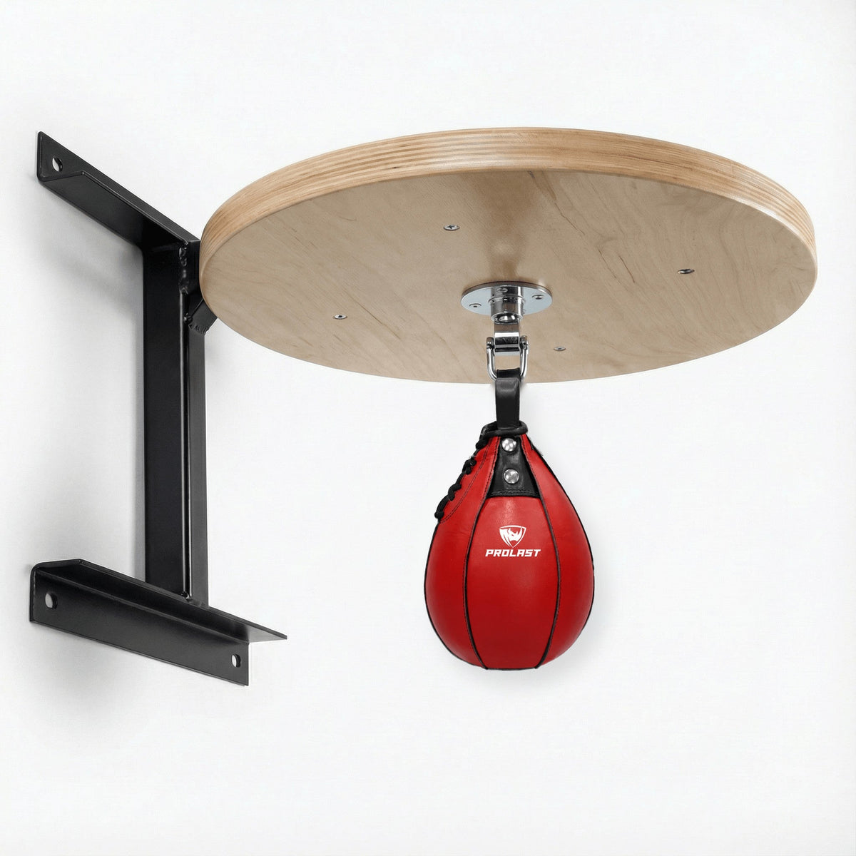 PROLAST red leather speed bag hanging from the PRO ELITE swivel under the PROLAST hardwood speed bag platform