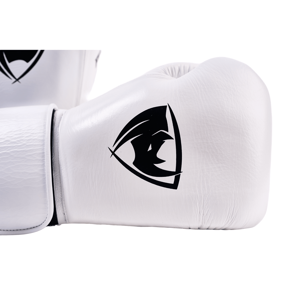 PROLAST PG professional boxing gloves in Columbian white, close-up of the black rhino logo and Velcro wrist strap