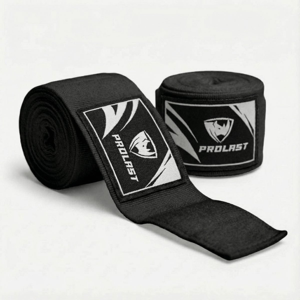PROLAST 180 in professional boxing hand wraps in black, two rolls, one partly unrolled, with PROLAST rhino labels