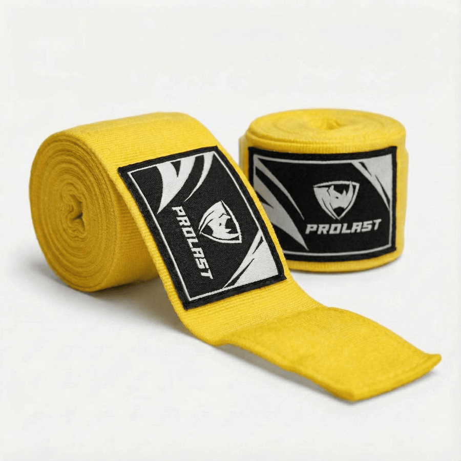 PROLAST 180 in professional boxing hand wraps in brilliant yellow, two rolls, one partly unrolled, with PROLAST rhino labels
