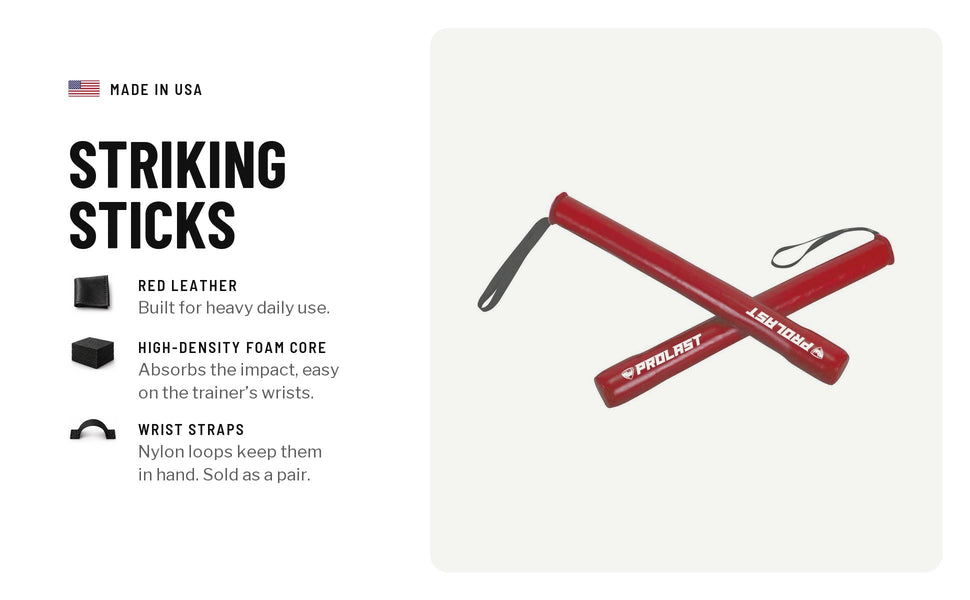 Striking sticks, a red pair: red leather built for heavy daily use; a high-density foam core that absorbs the impact, easy on the trainer’s wrists; nylon wrist loops keep them in hand; sold as a pair