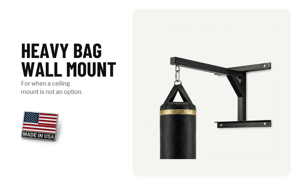 Heavy bag wall mount with a black bag hanging from it: for when a ceiling mount is not an option